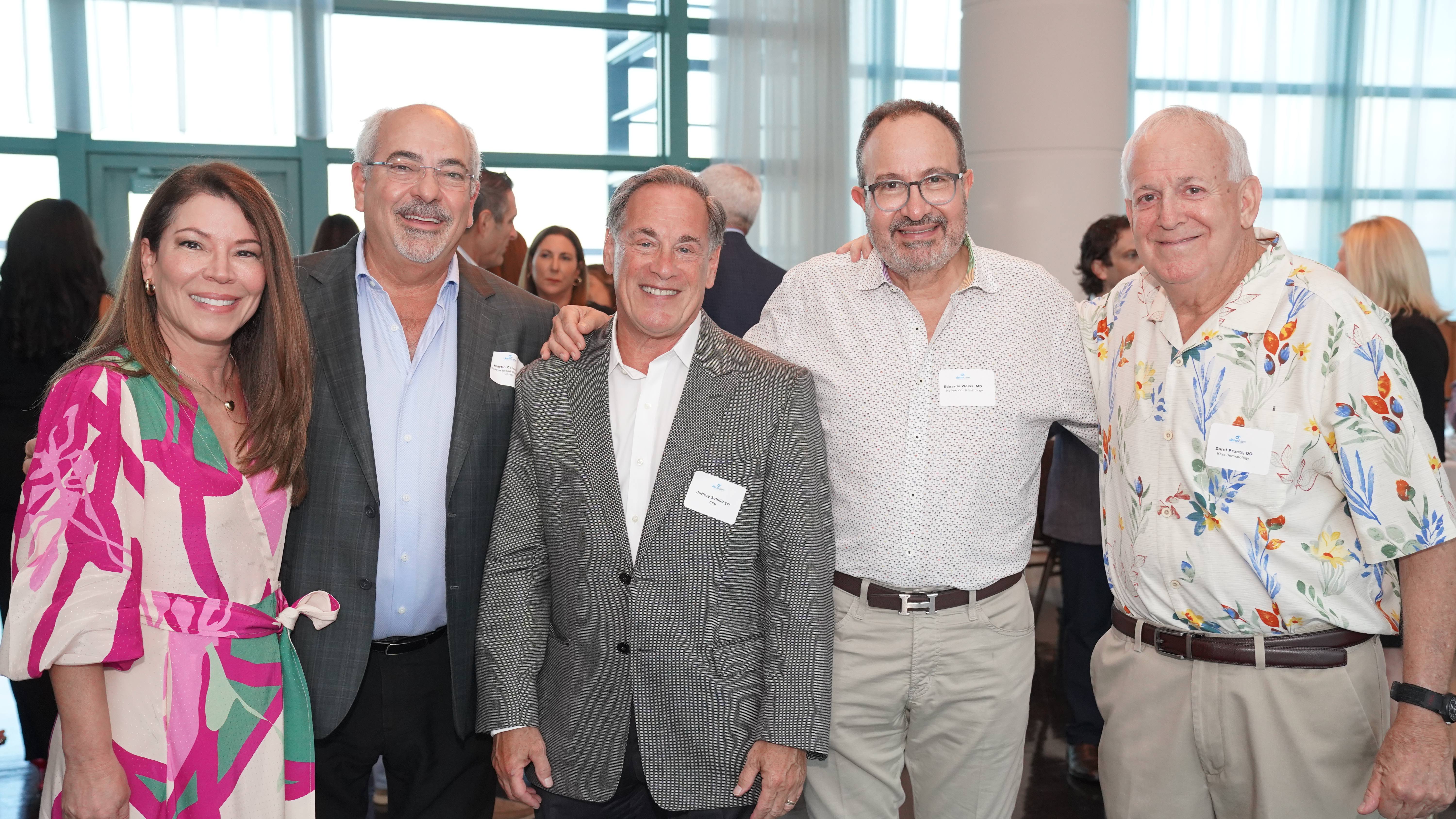 DermCare partner physicians and leadership together at a company event